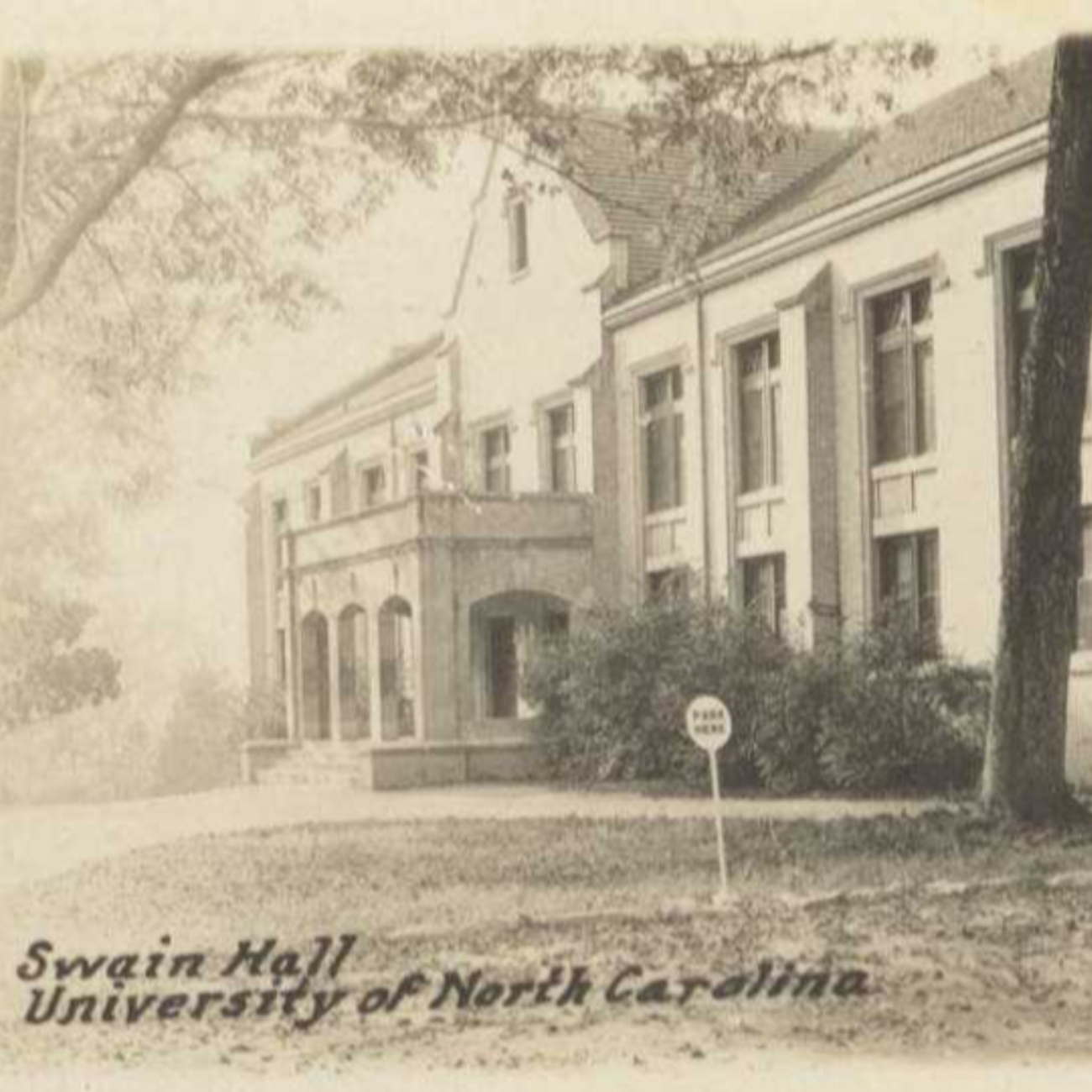 A black and white photo of a University building. 